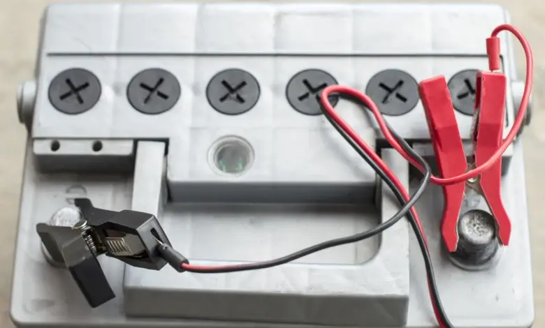Car battery with clamps
