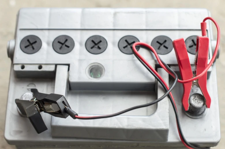 Car battery with clamps