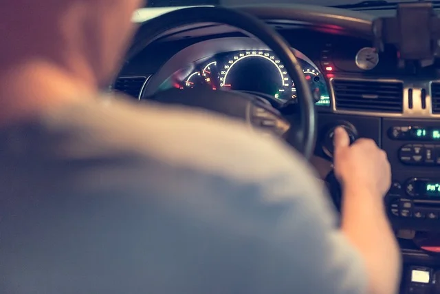 Person driving car interior