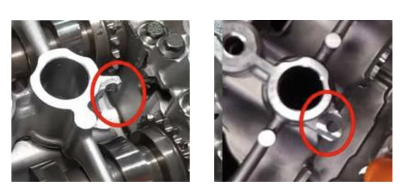 Detailní pohled na vnitřek motoru s viditelnými ložisky.