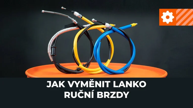 Handbrake cables coiled on orange stand