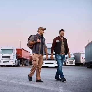 Truck drivers walking