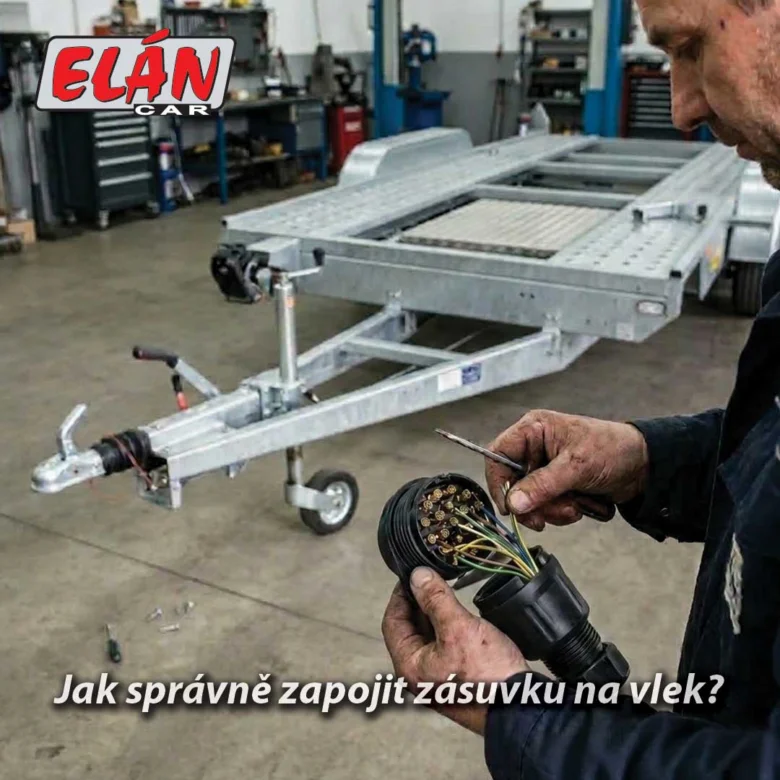 Muž zapojuje zásuvku přívěsu s viditelnými vodiči v dílně