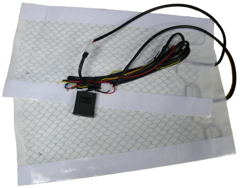 Heated car seat pad with wiring harness and controller modul